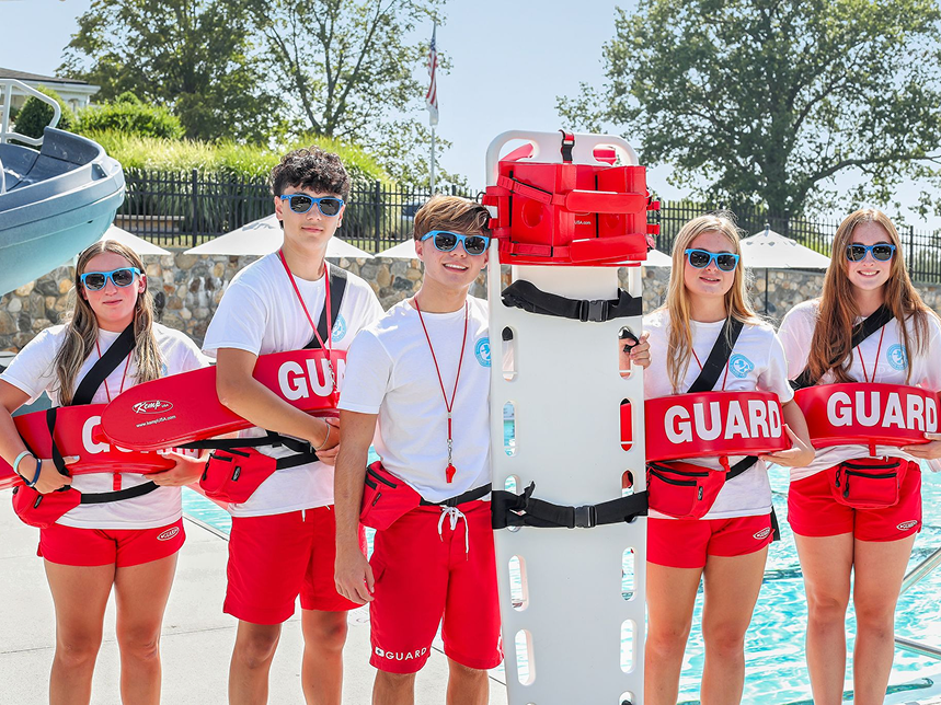 Group of lifeguards at pool